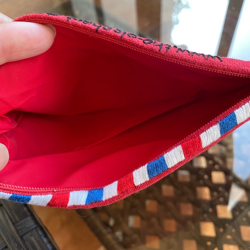 Cute little, red, zipper pouch. Brand new w/tag. 100% linen.
